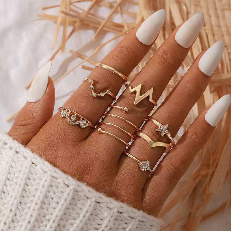 Gold Plated Set of 8 Heartbeat inspired Contemporary Stackable Rings Set For Women and Girls