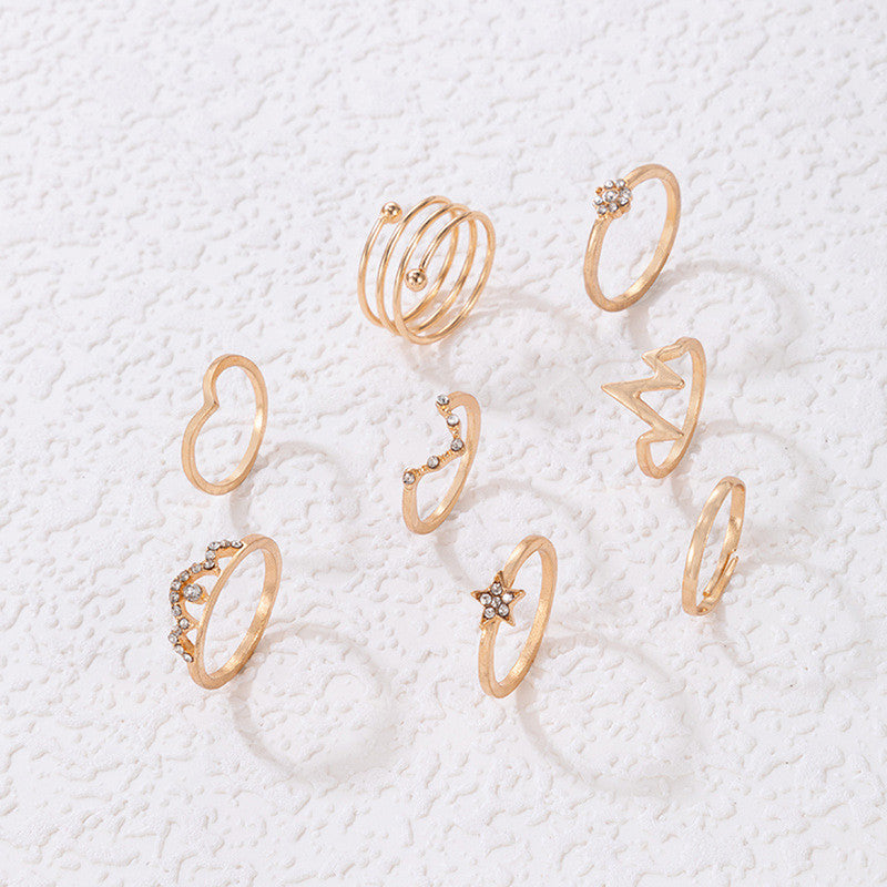 Gold Plated Set of 8 Heartbeat inspired Contemporary Stackable Rings Set For Women and Girls