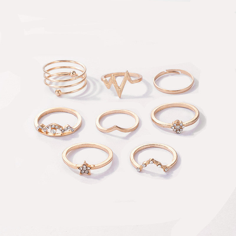 Gold Plated Set of 8 Heartbeat inspired Contemporary Stackable Rings Set For Women and Girls