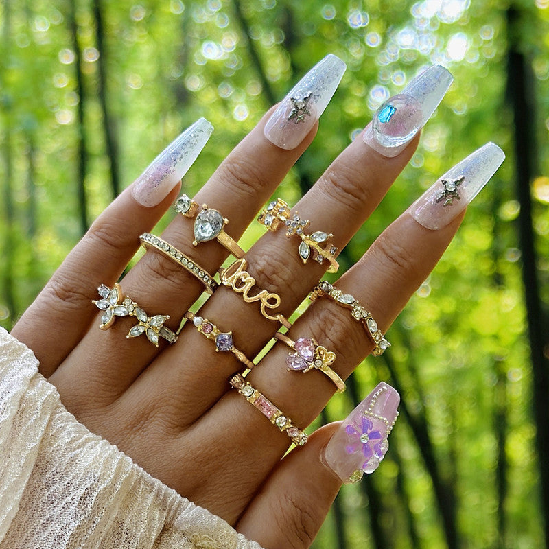 Trending Gold Plated Love inspired Set of 9 Stackable Finger Rings