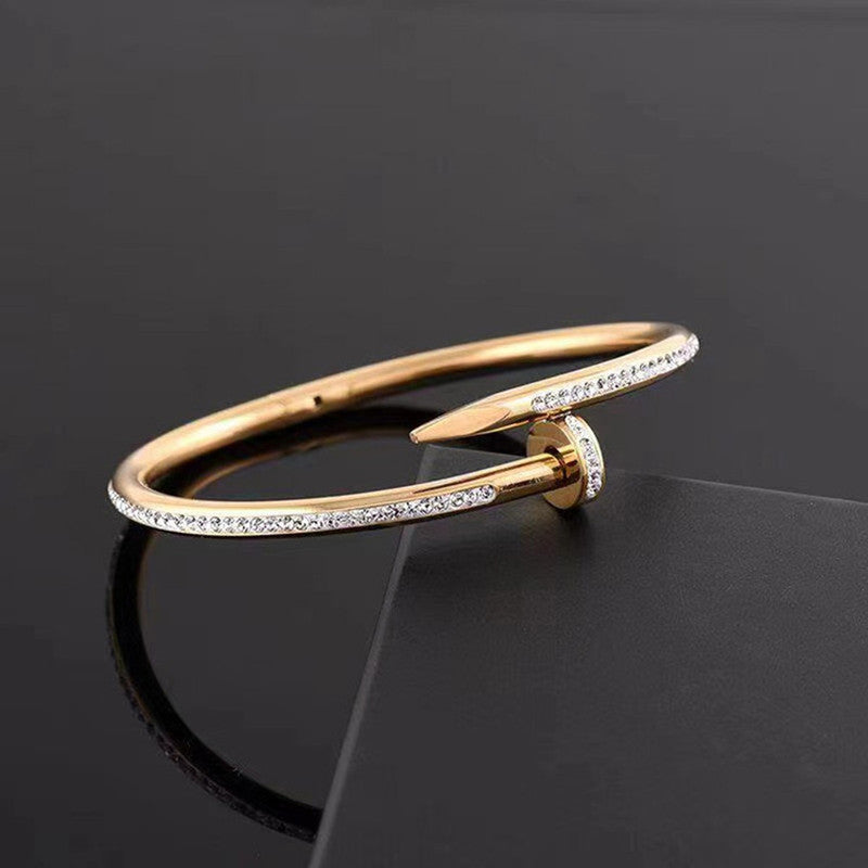 Stainless Steel Gold Plated Stainless Steel Anti Tarnish AD Studded Nail Bracelet For Women