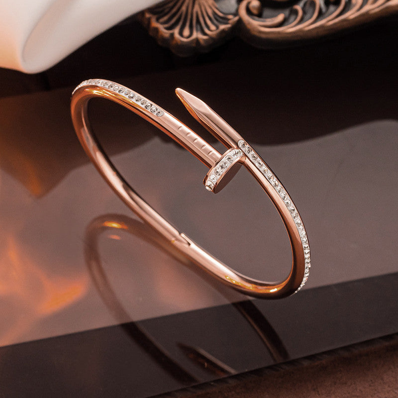 Stainless Steel Rose Gold Plated Stainless Steel AD Studded Nail Bracelet For Women