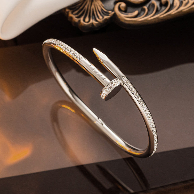 Stainless Steel Silver Plated Stainless Steel Anti Tarnish AD Studded Nail Bracelet For Women