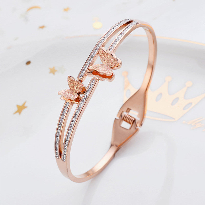 Stainless Steel Rose Gold Plated Butterfly inspired American Diamond Studded Bracelet For Women