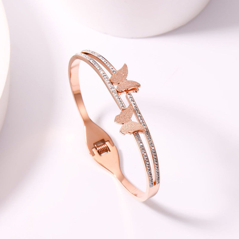 Stainless Steel Rose Gold Plated Butterfly inspired American Diamond Studded Bracelet For Women