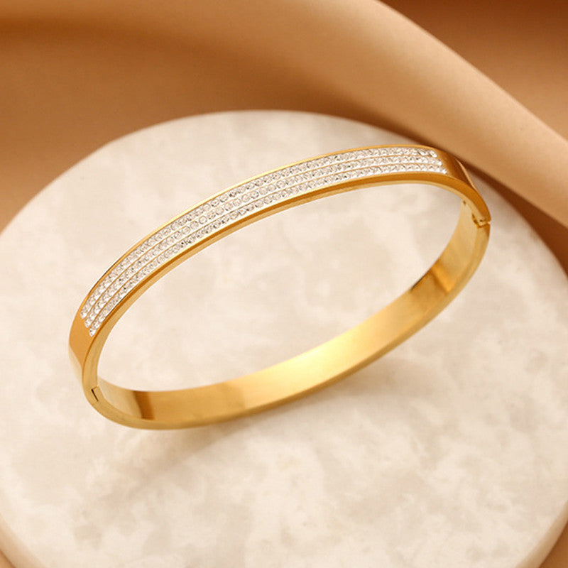 Stainless Steel Gold Plated Triple Lines American Diamond Contemporary Anti-Tarnish Bracelet For Women