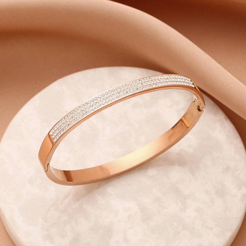 Stainless Steel Rose Gold Plated Triple Lines American Diamond Contemporary Bracelet For Women