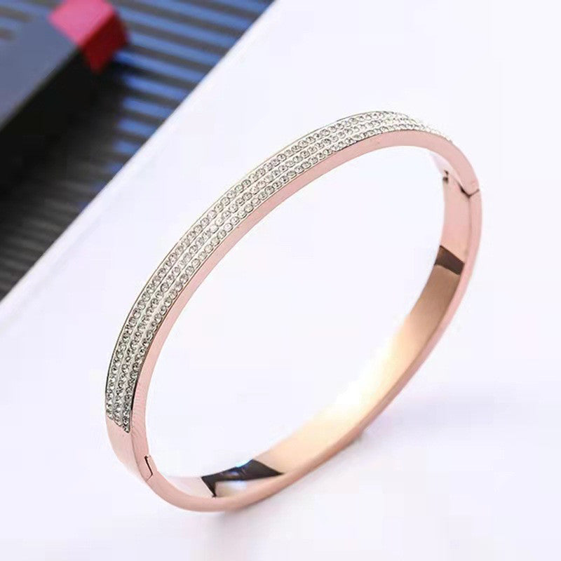 Stainless Steel Rose Gold Plated Triple Lines American Diamond Contemporary Bracelet For Women