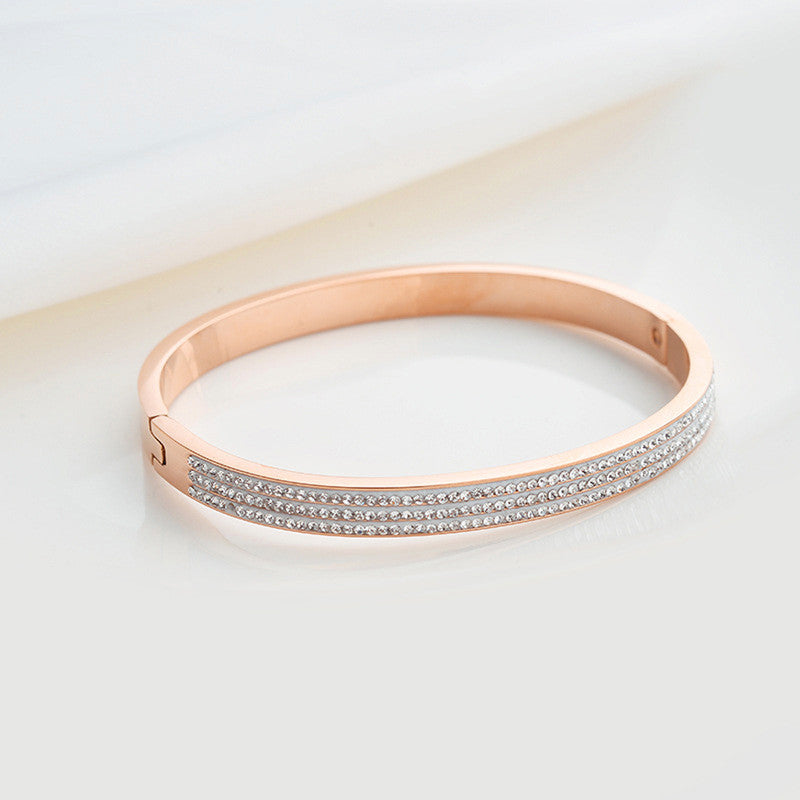 Stainless Steel Rose Gold Plated Triple Lines American Diamond Contemporary Bracelet For Women