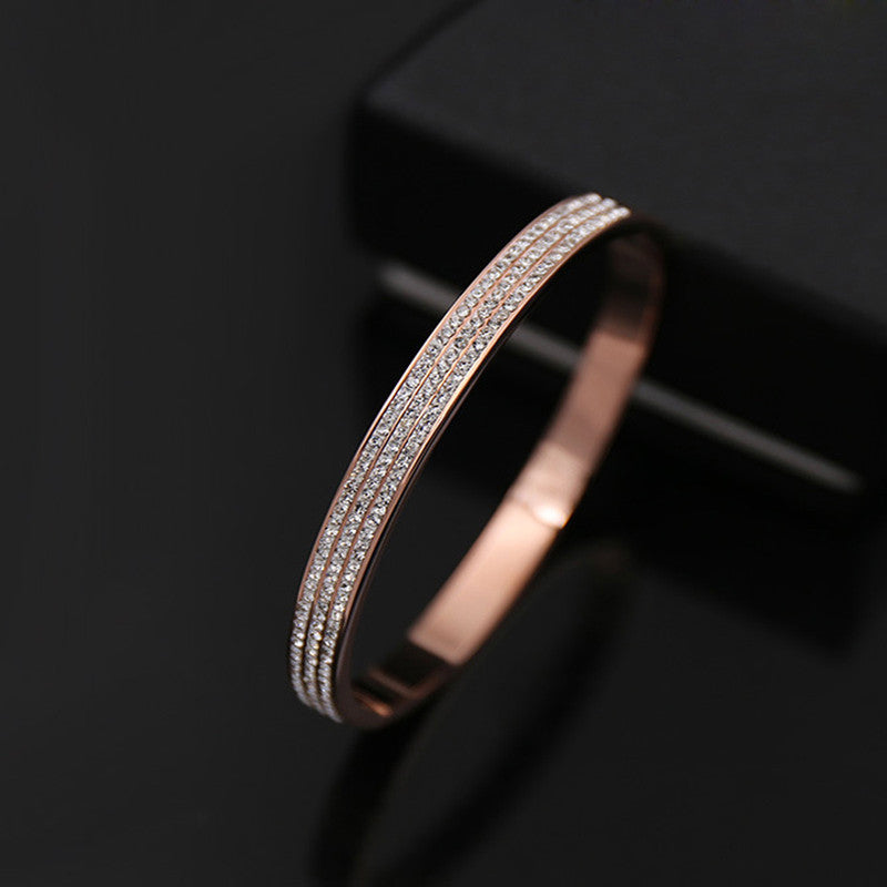 Stainless Steel Rose Gold Plated Triple Lines American Diamond Contemporary Bracelet For Women