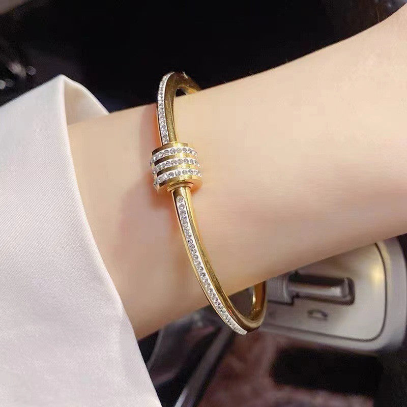 Stainless Steel Gold Plated American Diamond Studded Bangle Style Anti-Tarnish Bracelet For Women