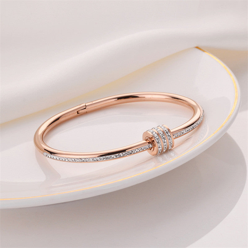 Stainless Steel Rose Gold Plated American Diamond Studded Bangle Style Bracelet For Women