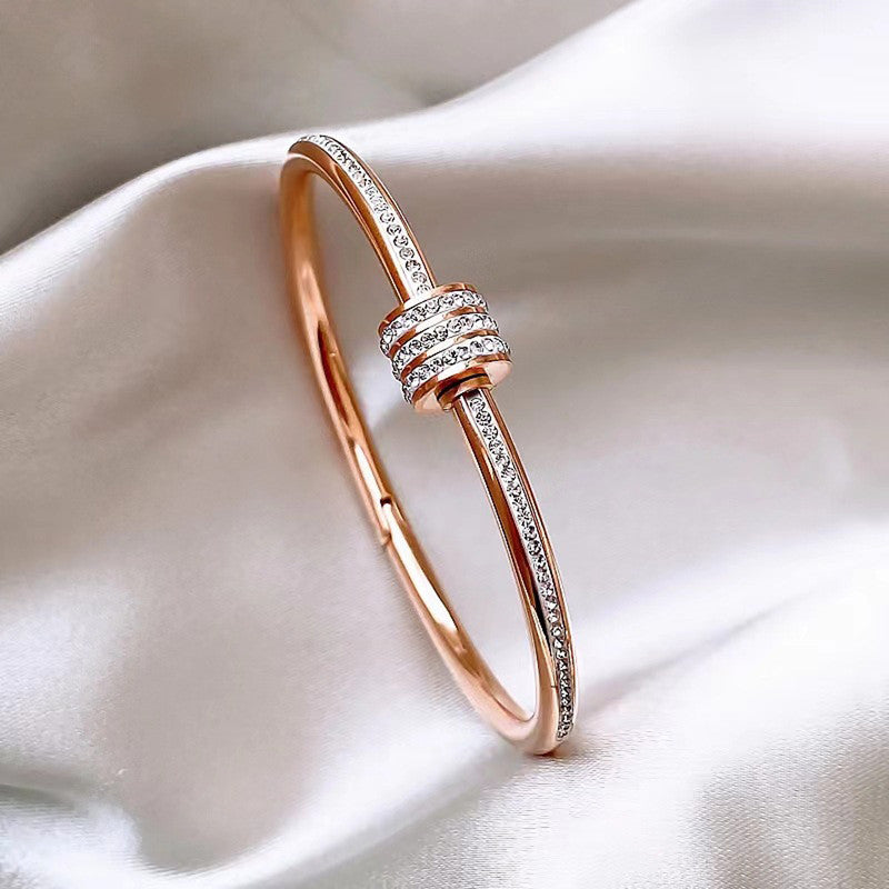 Stainless Steel Rose Gold Plated American Diamond Studded Bangle Style Bracelet For Women