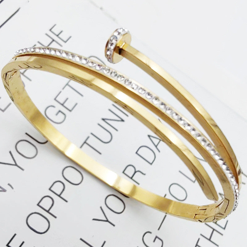 Stainless Steel Gold Plated American Diamond Studded Nail Anti-Tarnish Bracelet For Women