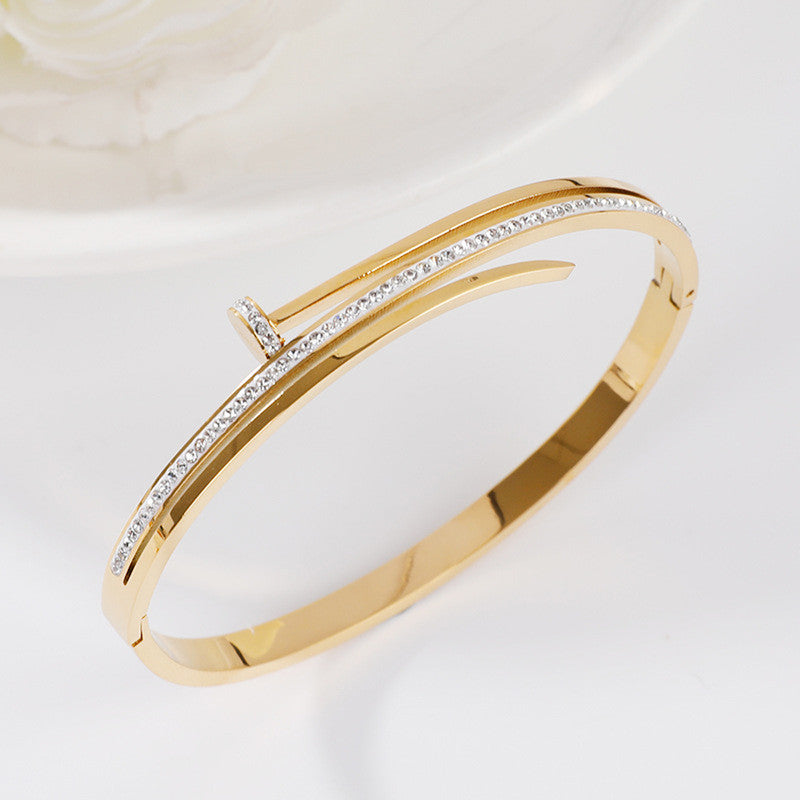 Stainless Steel Gold Plated American Diamond Studded Nail Anti-Tarnish Bracelet For Women