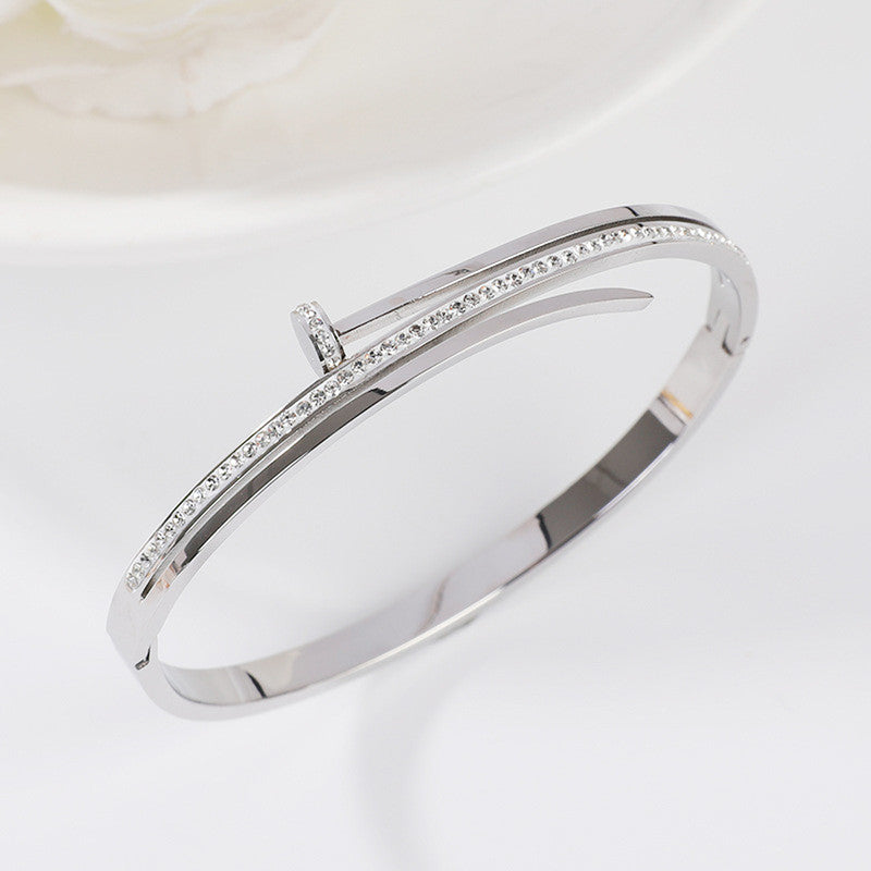 Stainless Steel Silver Plated American Diamond Studded Nail Anti-Tarnish Bracelet For Women