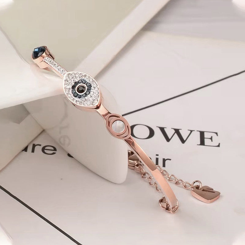 Stainless Steel Rose Gold-Plated American Diamond Evil Eye Bangle-Style Bracelet For Women