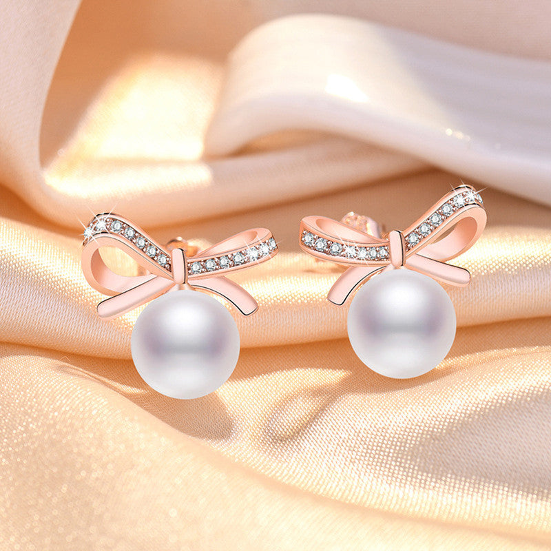 Rose Gold Plated American Diamond Studded Bow-Tie Shape Korean Stud Earrings