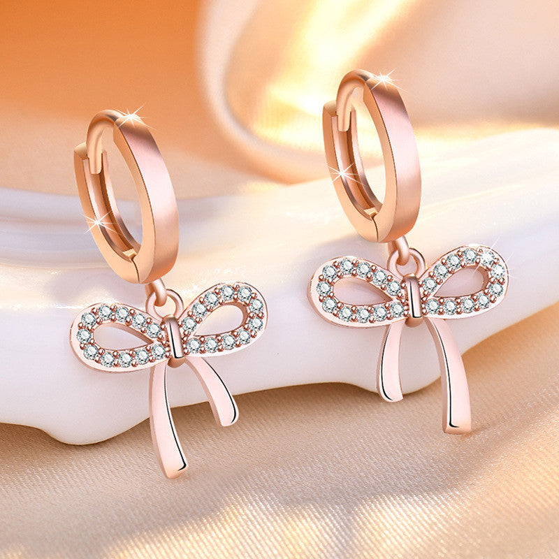 Rose Gold Plated American Diamond Studded Bow-Tie Shape Korean Stud Earrings