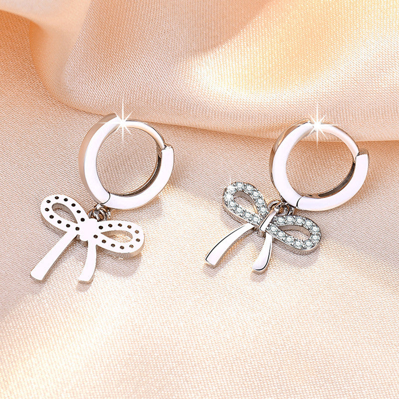 Silver Plated American Diamond Studded Bow-Tie Shape Korean Stud Earrings