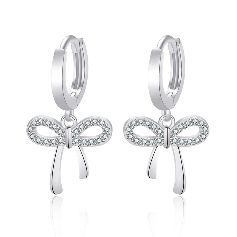 Silver Plated American Diamond Studded Bow-Tie Shape Korean Stud Earrings