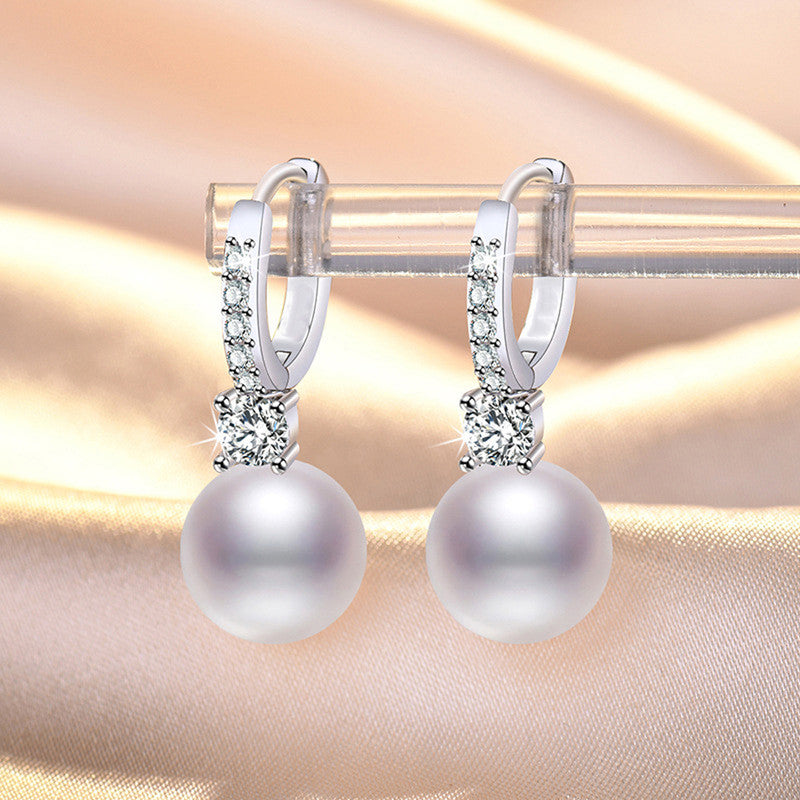 Silver Plated American Diamond Studded Contemporary Pearl Korean Drop Earrings