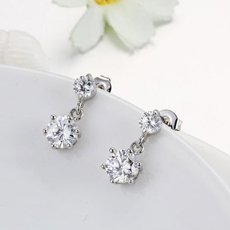 Silver Plated American Diamond Studded Hexagon Shape Korean Drop Earrings