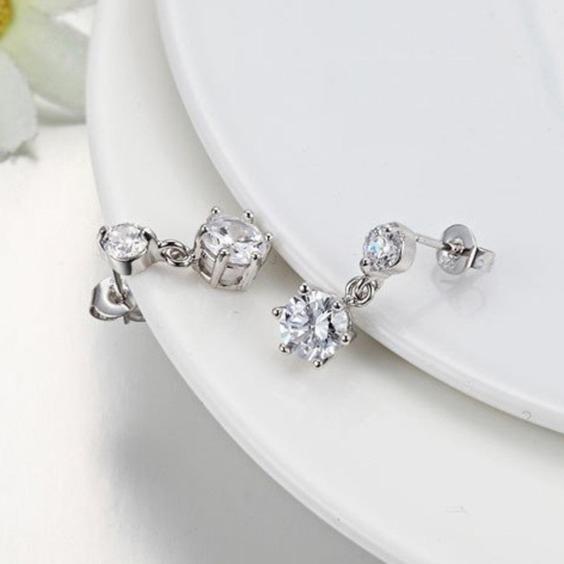 Silver Plated American Diamond Studded Hexagon Shape Korean Drop Earrings