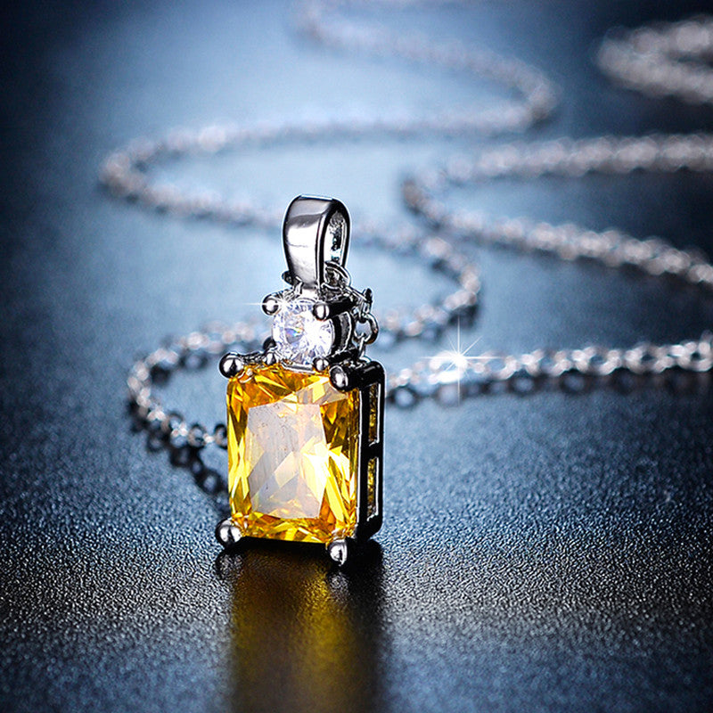 Silver Plated Crystal Studded Geometrical Yellow Stone Anti Tarnish Solitaire Pendant