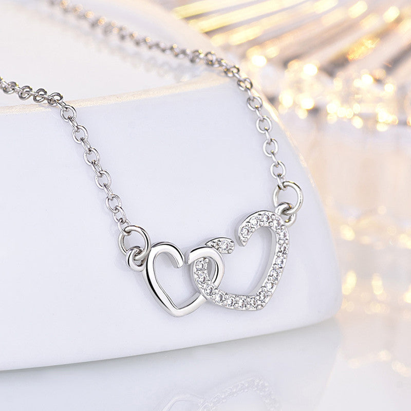 Silver Plated American Diamond Studded Dual Heart Contemporary Korean Pendant