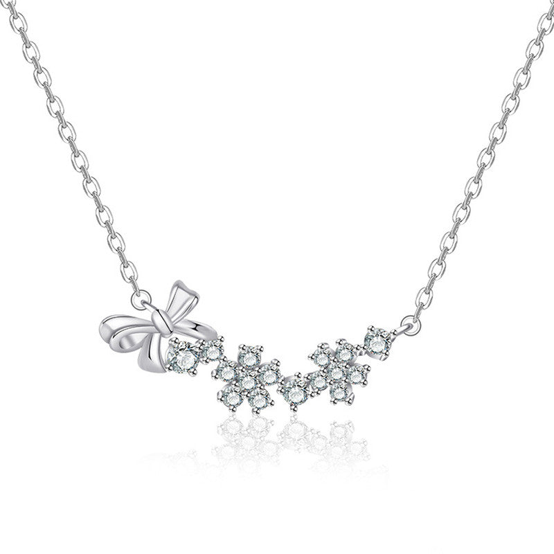 Silver Plated American Diamond Studded Bow-Tie Themed Contemporary Pendant